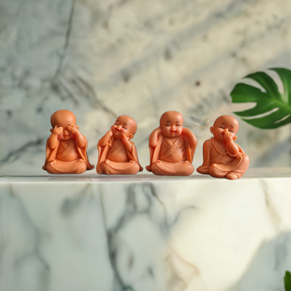 Set of 4 Pink Little Monks Statues for Good Luck Zendai.png