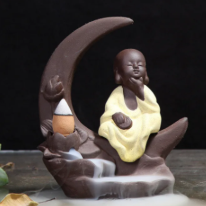 meditating buddha backflow incense burner.png