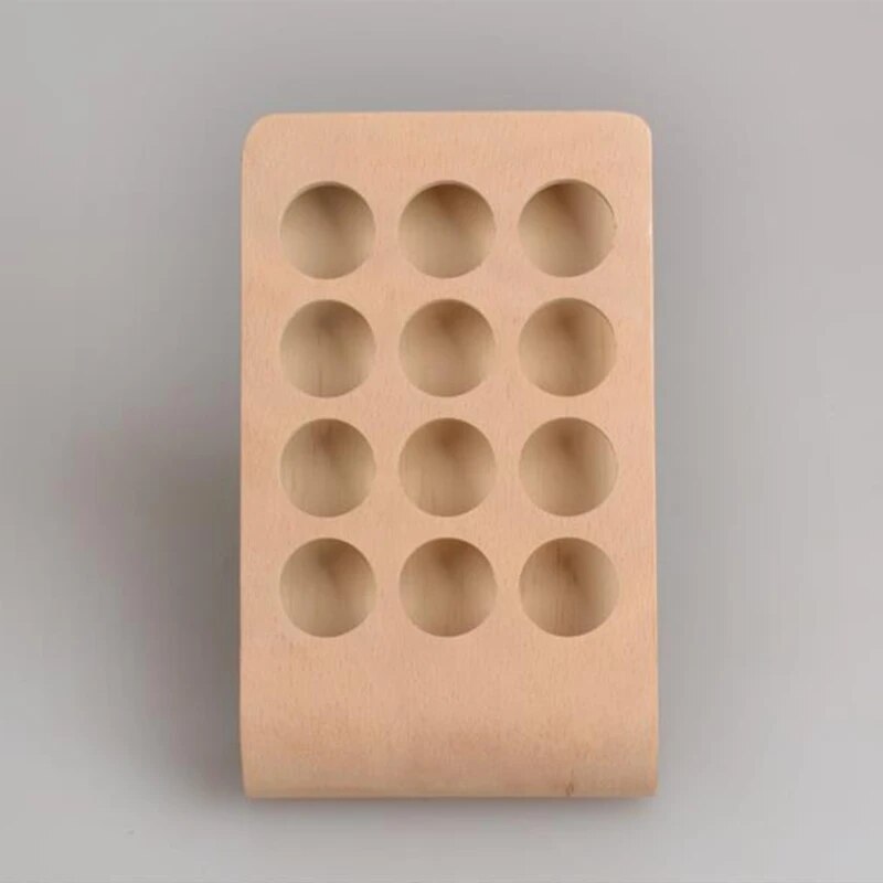 wooden essential oil stand bottles.jpg